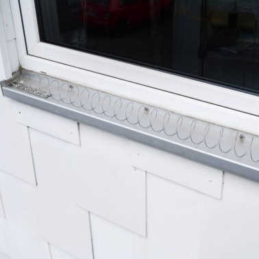 Bird Coil - Pigeon Deterrent Installed on Window Ledge